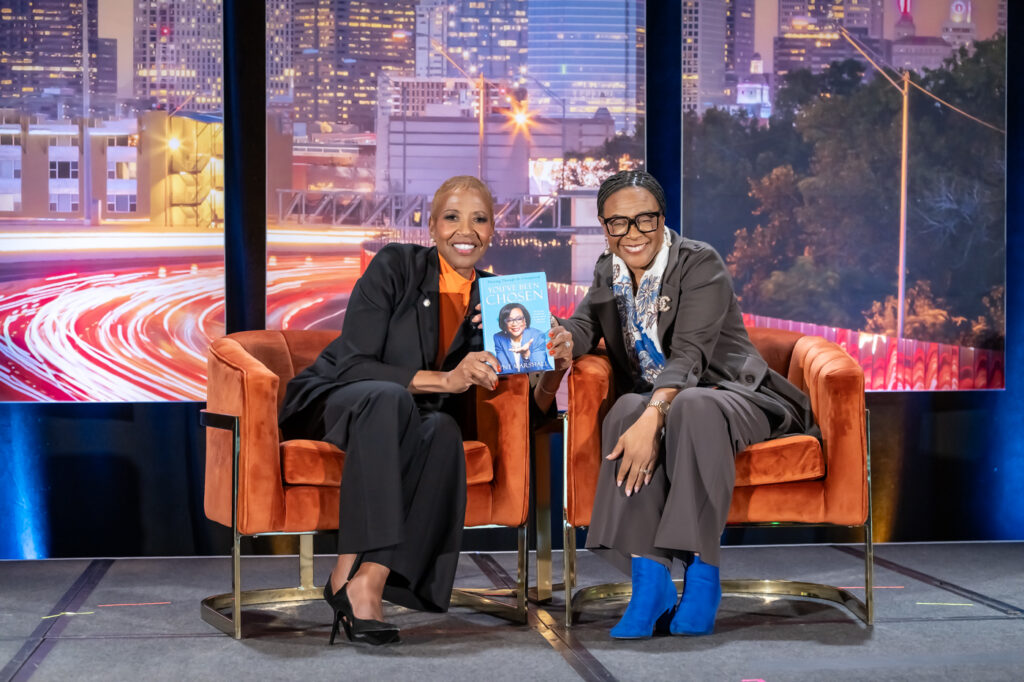 Cynt posing with book